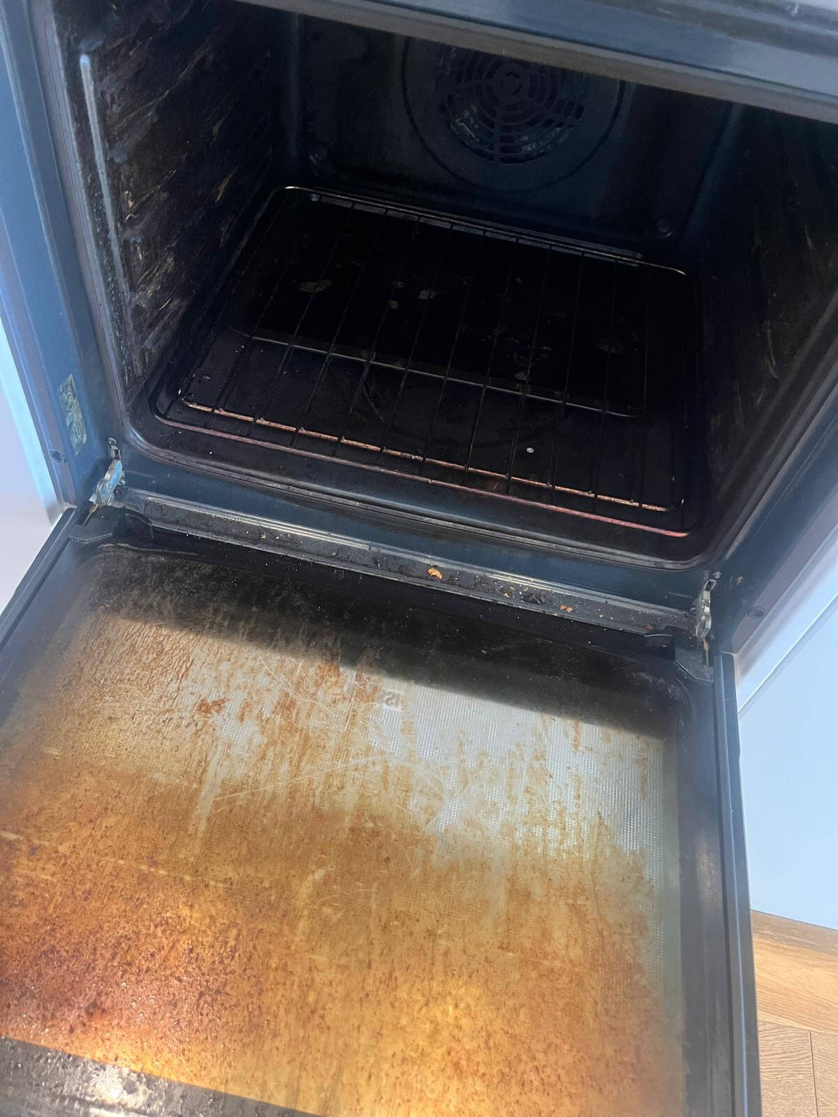 Oven Door Glass Cleaning Before